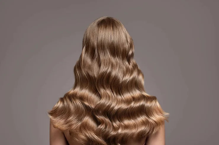 Les bienfaits de la vitamine C pour des cheveux plus brillants et sains grâce à une eau filtrée